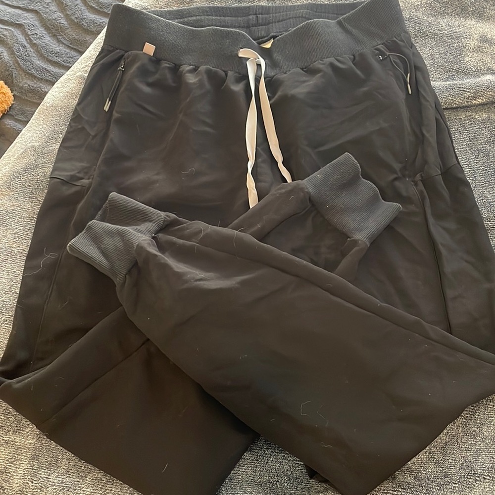 WearFigs black scrubs, limited edition zip pocket joggers, and Catarina top.